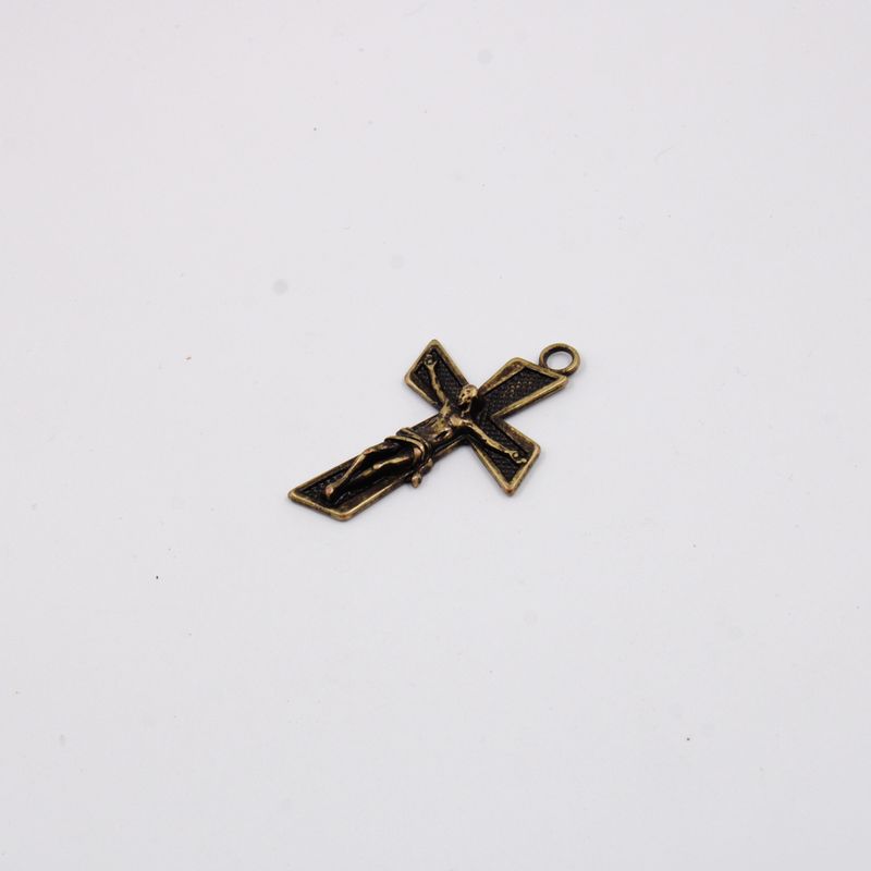 PINGENTE-CRUCIFIXO-TRABALHADO-62X40MM-EM-ZAMAC-O-KG---OURO-VELHO