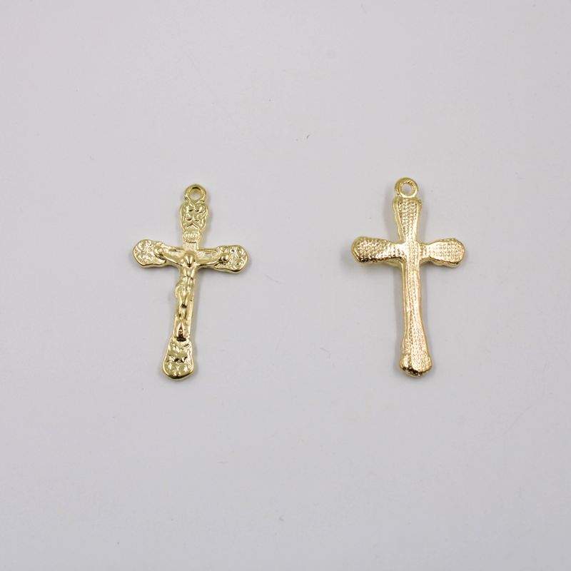 PINGENTE-CRUZ-40X22MM-EM-ZAMAC-COM-100GR---073---DOURADO-073