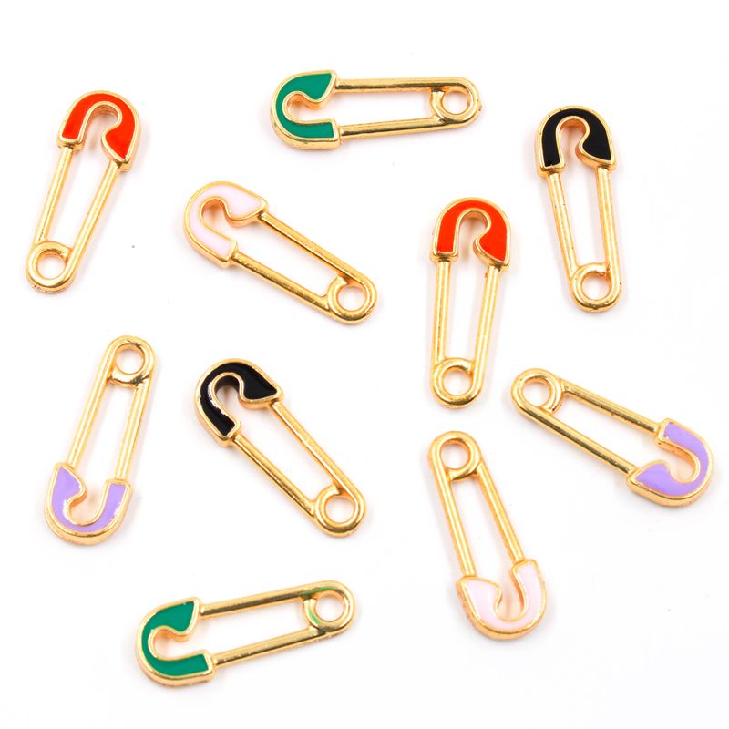 PINGENTE-CLIPS-RESINADO-EM-ZAMAC-COM-10-PECAS---073---DOURADO-073