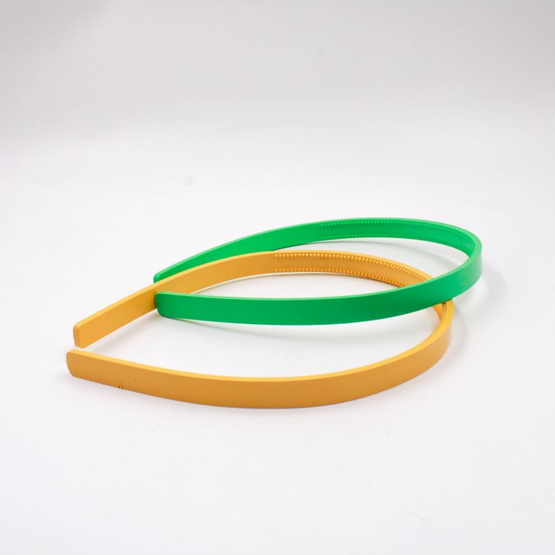 TIARA-COM-DENTE-10MM-EM-PLASTICO-COM-2-UNIDADES---VERDE-E-AMARELO