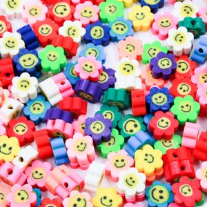 ENTREMEIO FIMO FLOR SMILE 10MM EM PVC COM 50 PEÇAS