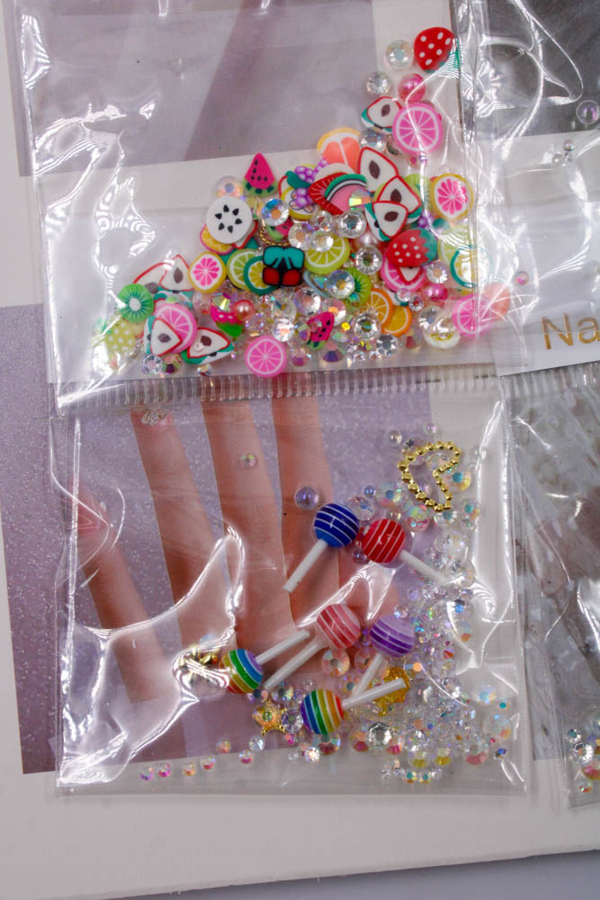 CARTELA-DE-APLIQUE-NAILS-ART-EM-PLASTICO-COM-12-PACOTES---984---COLORIDO-MISTURADO