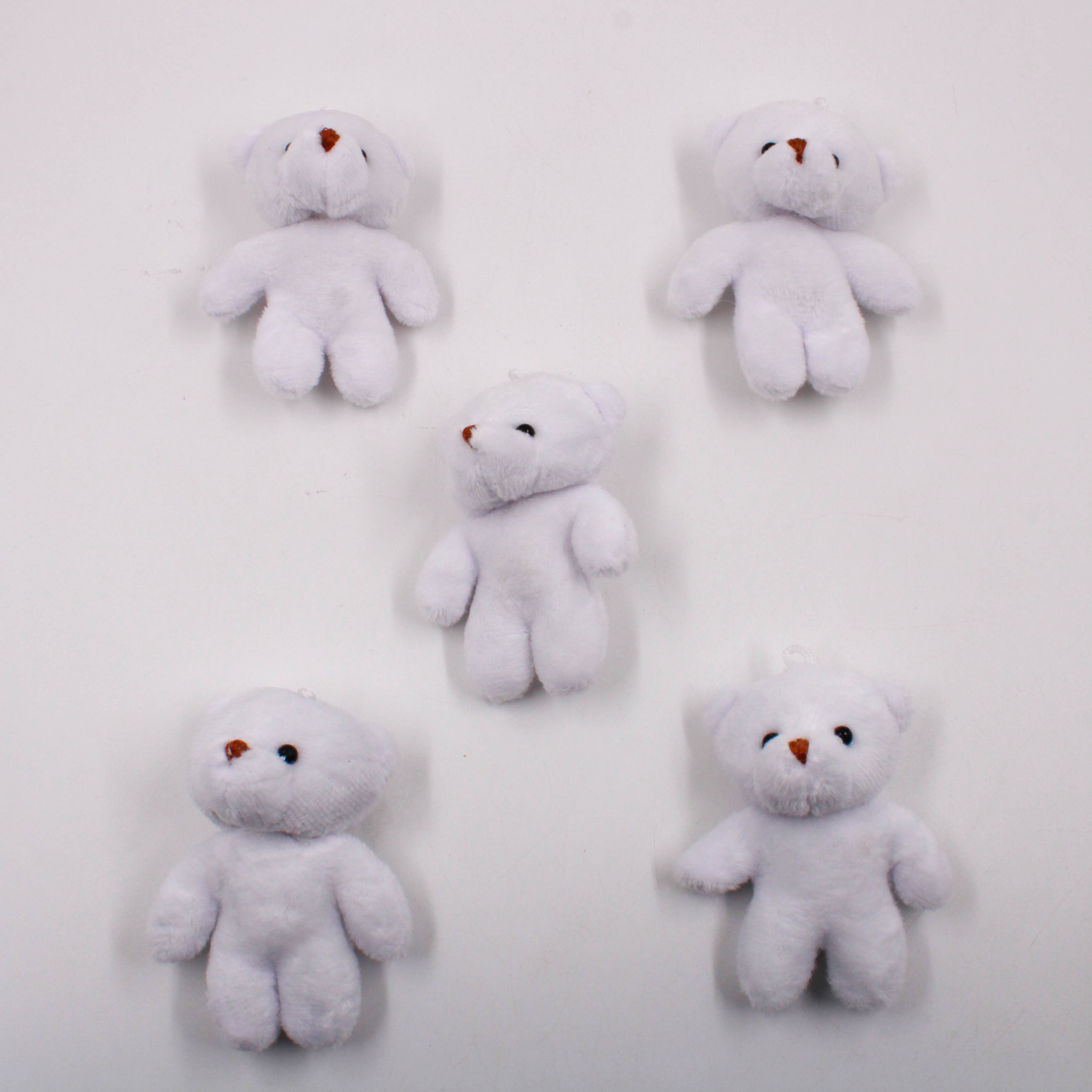 URSO-DE-PELUCIA-8CM-COM-05-PECAS---BRANCO