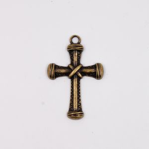 PINGENTE CRUZ TRABALHADA 65X44MM EM ZAMAC O KG