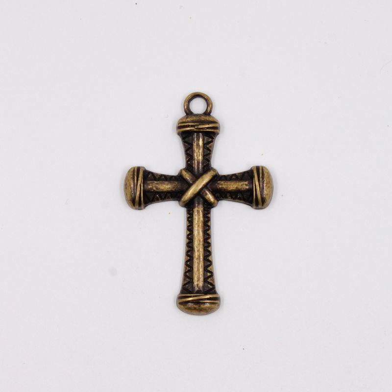 PINGENTE-CRUZ-TRABALHADA-65X44MM-EM-ZAMAC-O-KG---OURO-VELHO