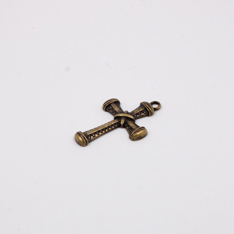 PINGENTE-CRUZ-TRABALHADA-65X44MM-EM-ZAMAC-O-KG---OURO-VELHO