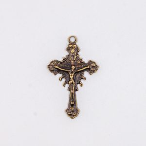 PINGENTE CRUCIFIXO TRABALHADO 51X31MM EM ZAMAC O KG