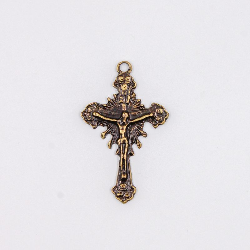 PINGENTE-CRUCIFIXO-TRABALHADO-51X31MM-EM-ZAMAC-O-KG---OURO-VELHO