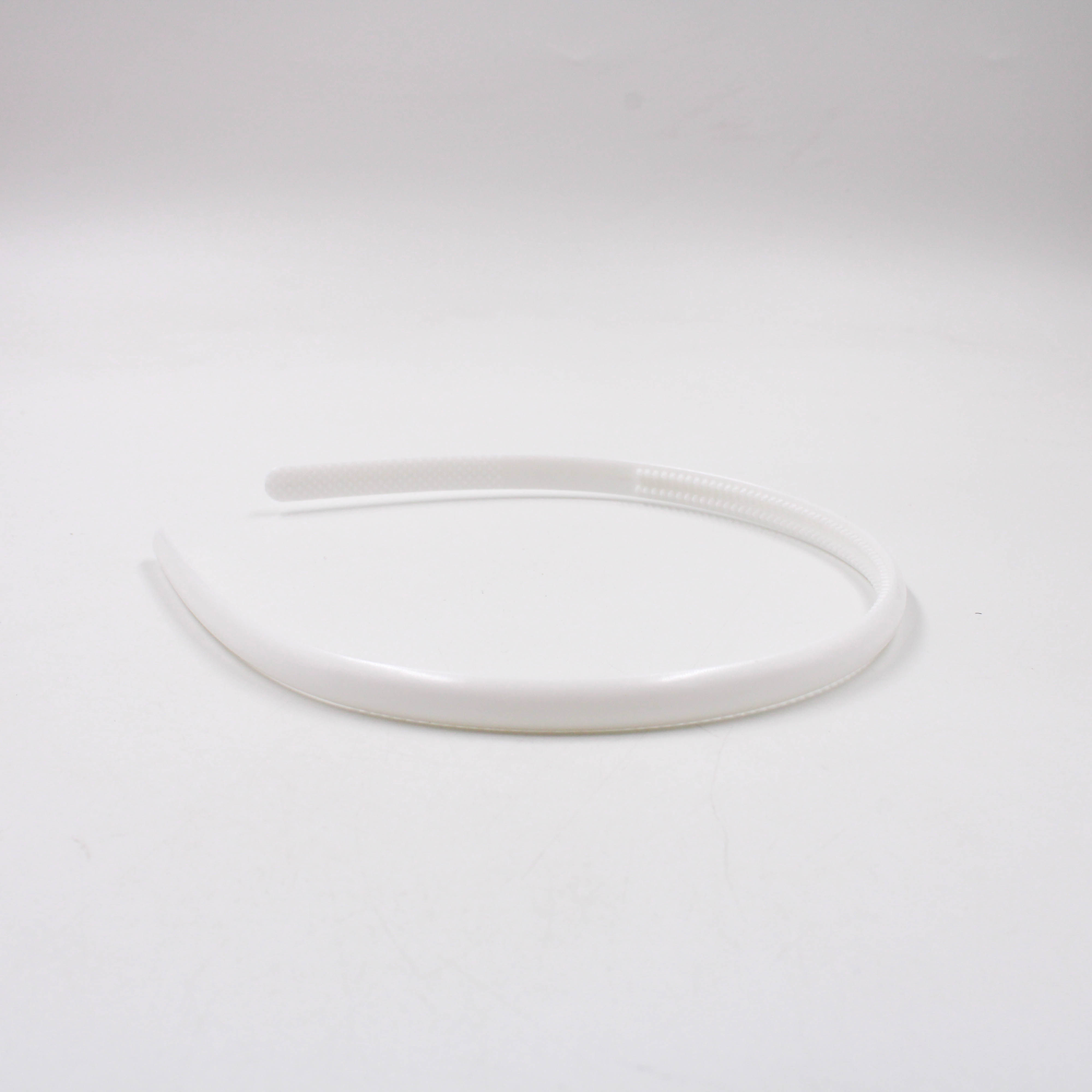 TIARA-ARREDONDADA-COM-DENTE-8MM-EM-PLASTICO-COM-12-UNIDADES-007T---BRANCO-007