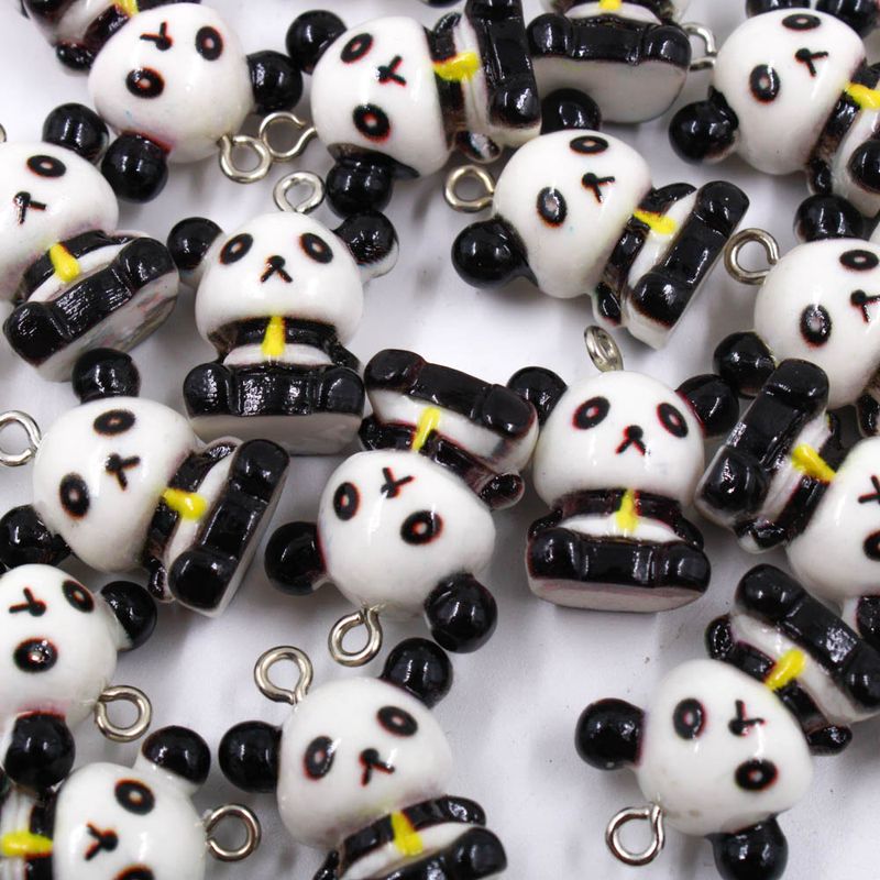 PINGENTE-PANDA-15X20MM-EM-RESINA-COM-50-PECAS---BRANCO-E-PRETO