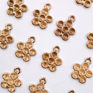 PINGENTE FLOR PARA STRASS 17,5MM EM ABS COM 250GR