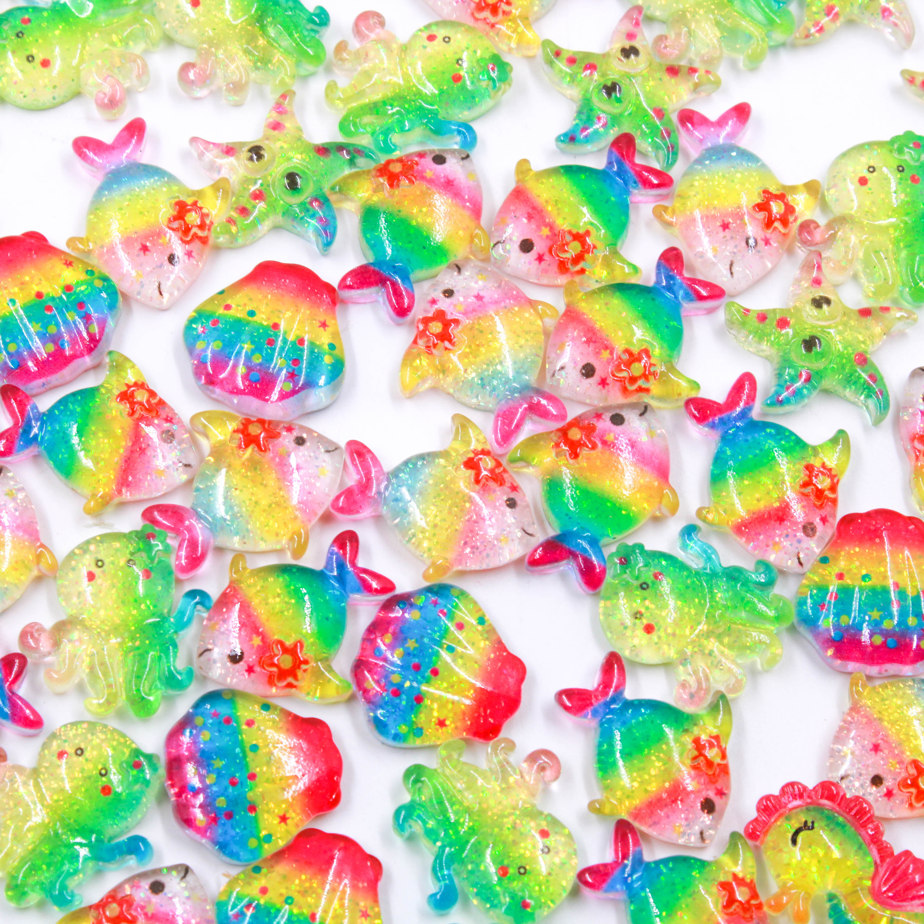 APLIQUE ANIMAIS MARINHOS 25X18MM EM RESINA COM 200 PEÇAS