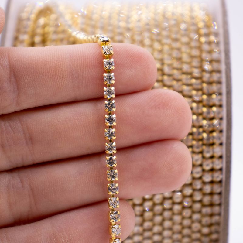 CORRENTE-DE-STRASS-JUNTA-SS12-EM-VIDRO-COM-50-METROS---543---DOURADO---CRISTAL