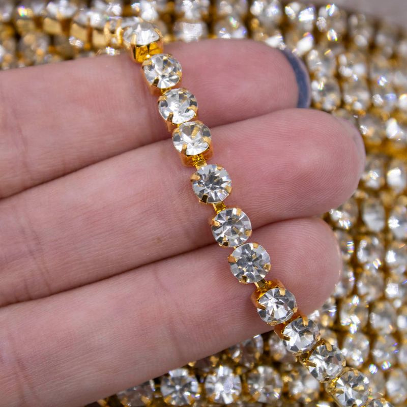 CORRENTE-DE-STRASS-JUNTA--SS24-EM-VIDRO-COM-20-METROS---543---DOURADO---CRISTAL