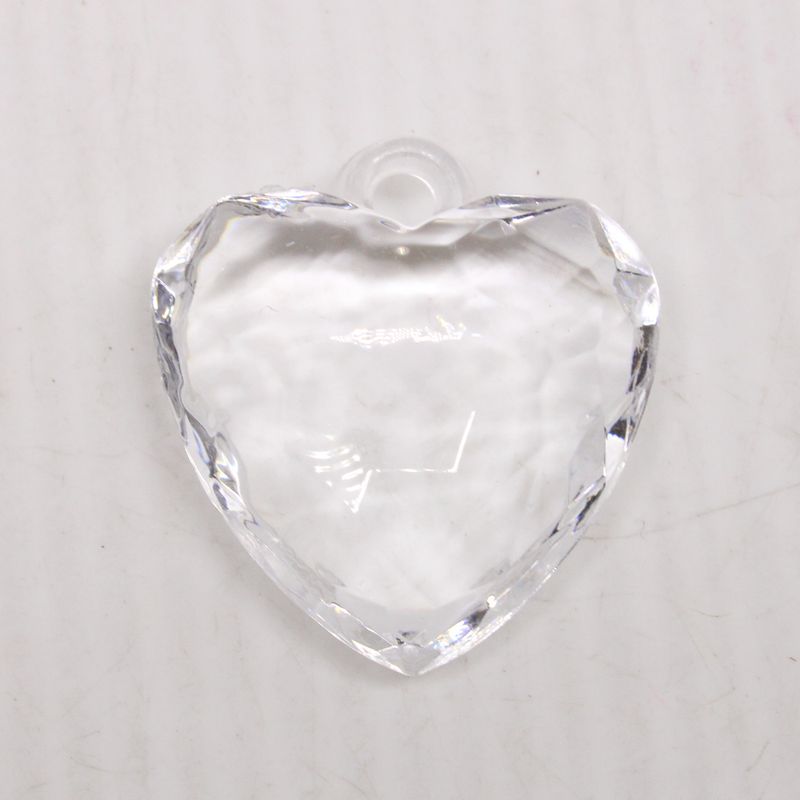 PINGENTE-CORACAO-23X31MM-EM-ACRILICO-COM-500GR-001---CRISTAL-TRANSPARENTE-001