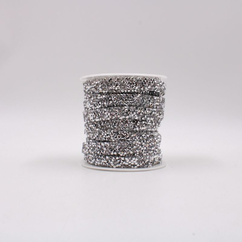 MANTA-EM-TIRA-DE-STRASS-10MM-ROLO-EM-RESINA-COM-01-METRO---NIQUEL