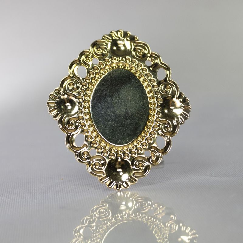 TAG-MOLDURA-OVAL-PONTUDA-PARA-CHATON-18X25MM-EM-FERRO-COM-20-PECAS-DOURADO