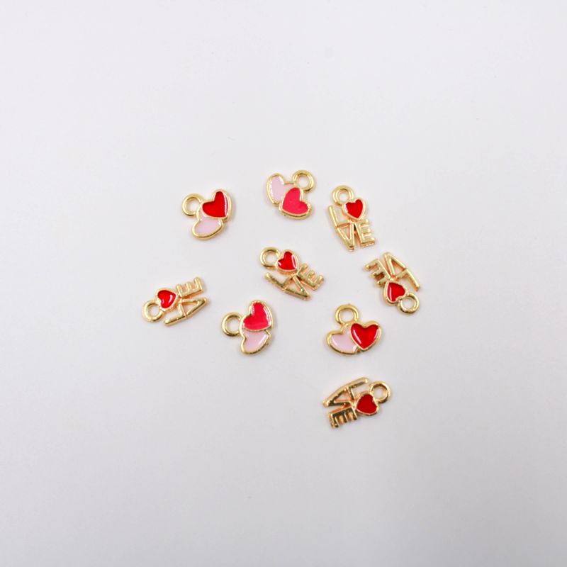 PINGENTE-LOVE-12X07MM-RESINADO-EM-ZAMAC-COM-02-PECAS---DOURADO