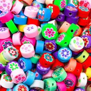 ENTREMEIO FIMO REDDONDO FLORES 10MM EM PVC COM 50 PEÇAS