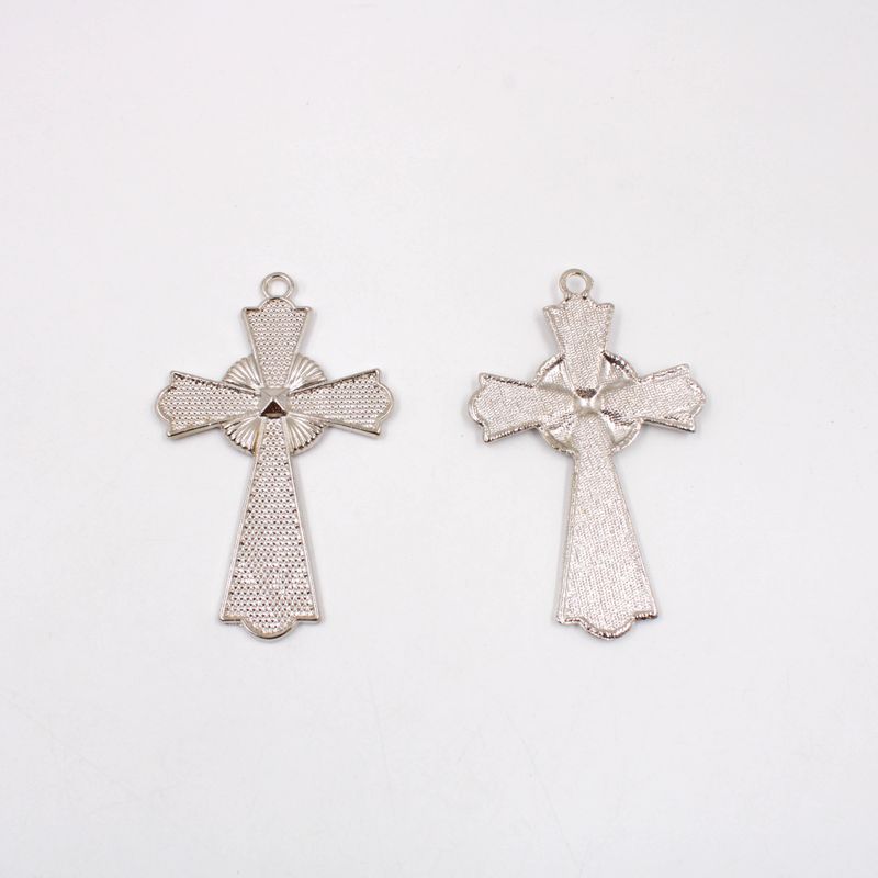 PINGENTE-CRUZ-82X52MM-EM-ZAMAC-COM-100GR---074---NIQUEL-074