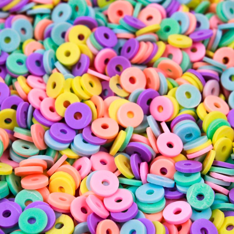 ENTREMEIO-FIMO-DISQUINHO-LEITOSO-06MM-EM-PVC-COM-50GR---503---COLORIDO-CLARO