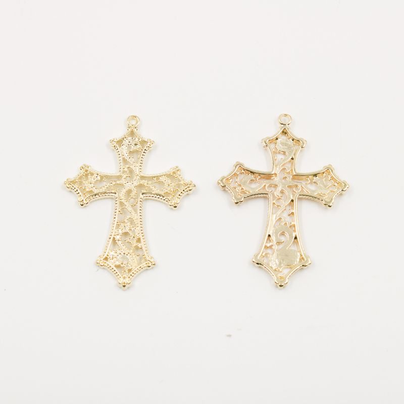 PINGENTE-CRUZ-VAZADA-59X38MM-EM-ZAMAC-COM-100GR---073---DOURADO-073