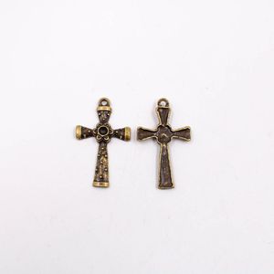 PINGENTE CRUZ TRABALHADA 47X28MM EM ZAMAC COM 12 PEÇAS