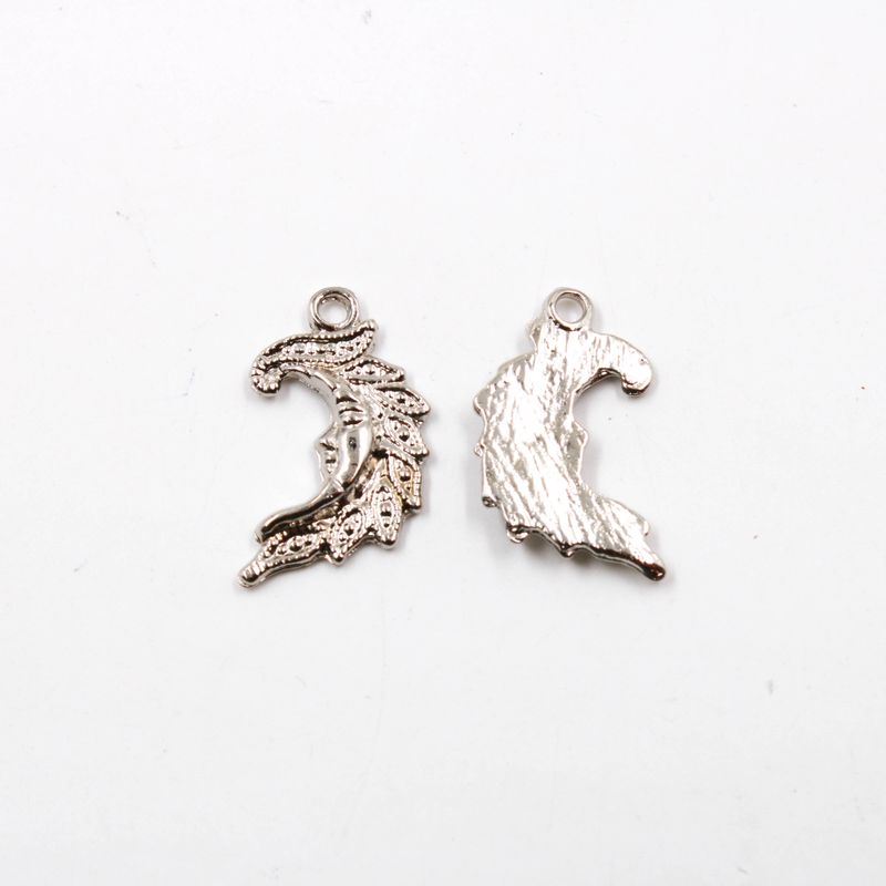 PINGENTE-LUA-26X14MM-EM-ZAMAC-COM-100GR---074---NIQUEL-074