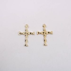 PINGENTE CATAFORETICO CRUZ TORCIDA 43X30MM EM ZAMAC COM 12 PEÇAS