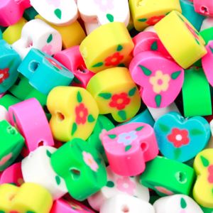 ENTREMEIO FIMO CORAÇÃO COM FLOR 10MM EM PVC COM 10 PEÇAS