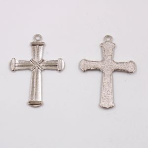 PINGENTE CRUZ AMARRADA  46 MM EM ZAMAC COM 100GR