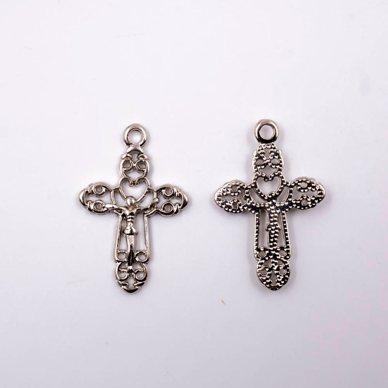 PINGENTE-CRUCIFIXO-VAZADO-32X21MM-EM-ZAMAC-COM-24-PECAS---NIQUEL