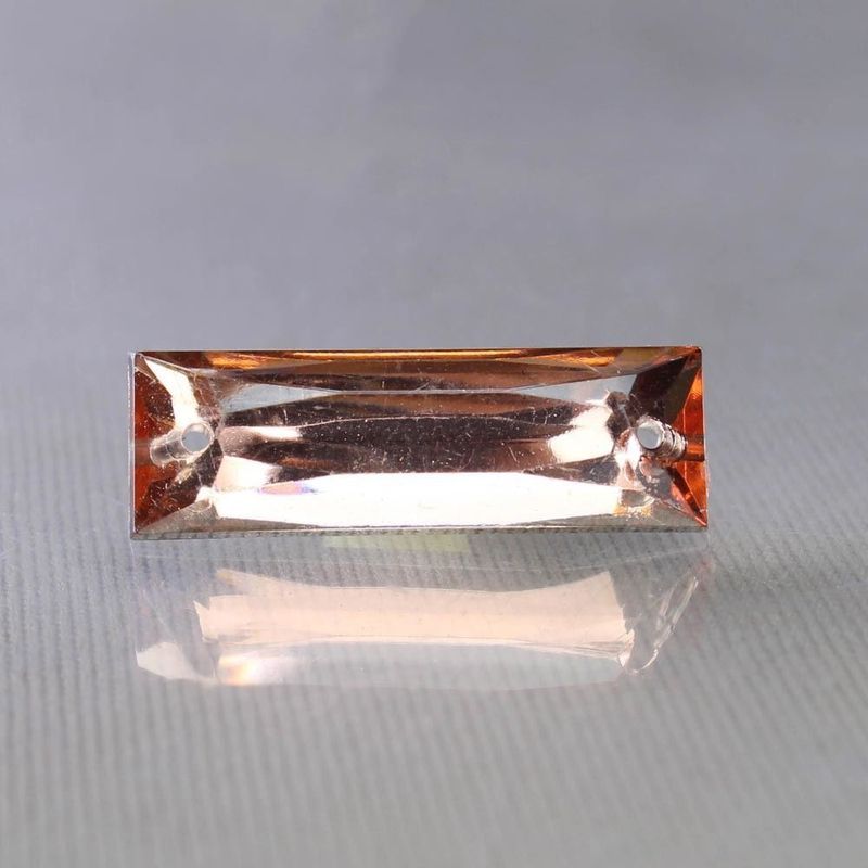 CHATON-PARA-COSTURA-PALITO-ACHATADO-7X18MM-EM-ACRILICO-COM-500GR-253D---PESSEGO-TRANSPARENTE