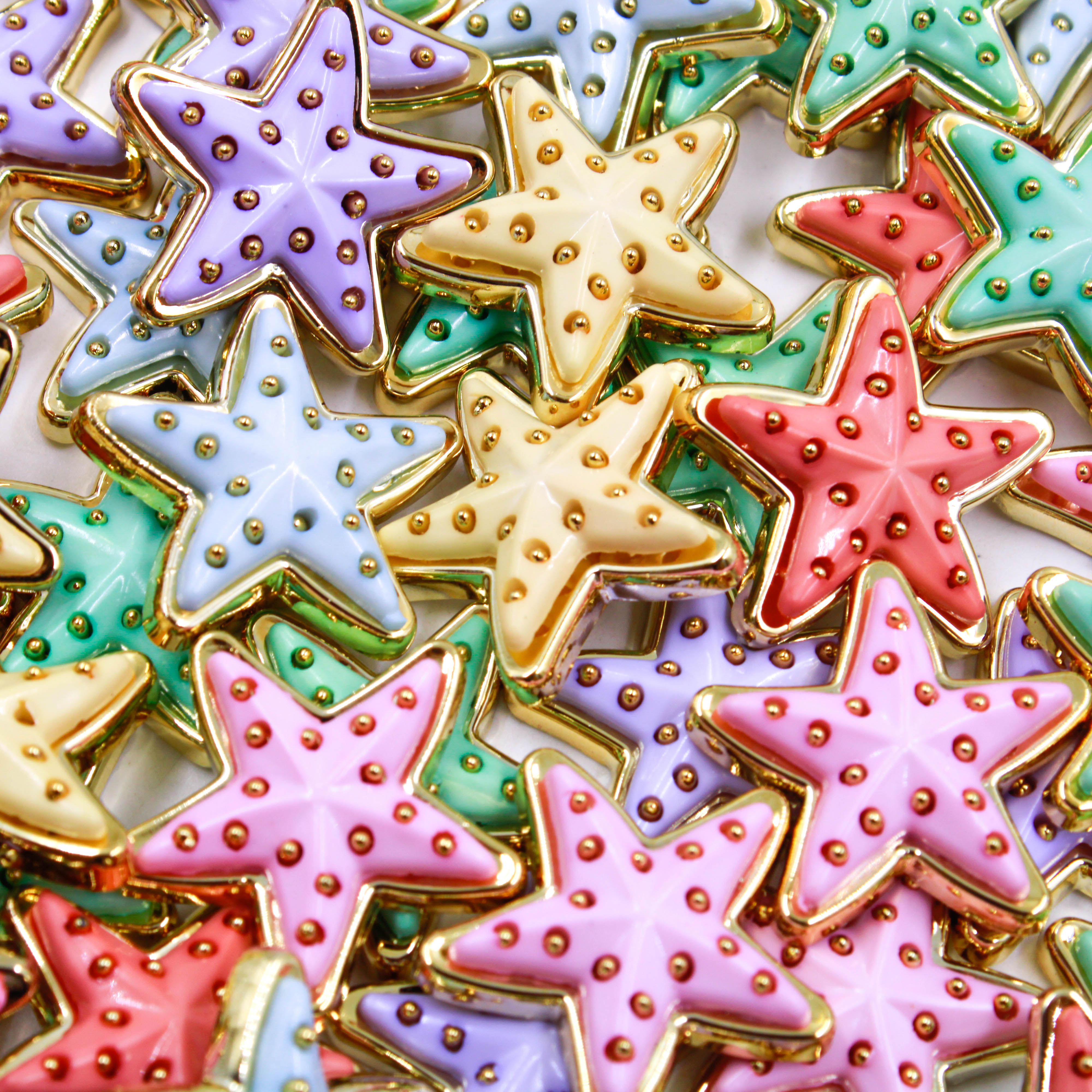 APLIQUE ESTRELA DO MAR 23X23MM COM 100 PEÇAS