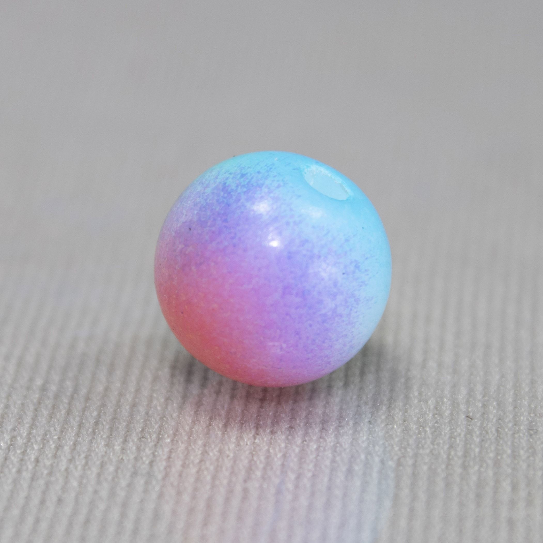 BOLA-TIE-DYE-PASSANTE-08MM-EM-PLASTICO-COM-50G264D---AZUL-BRANCO