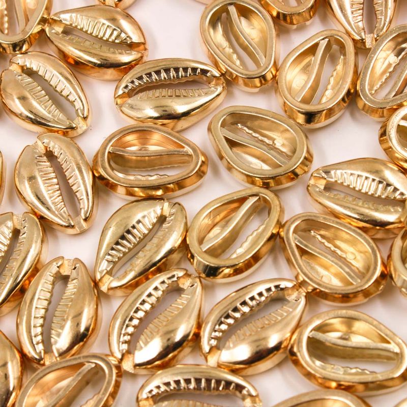 ENTREMEIO-BUZIOS-15X22MM-EM-ACRILICO-COM-200-PECAS---073---DOURADO-073