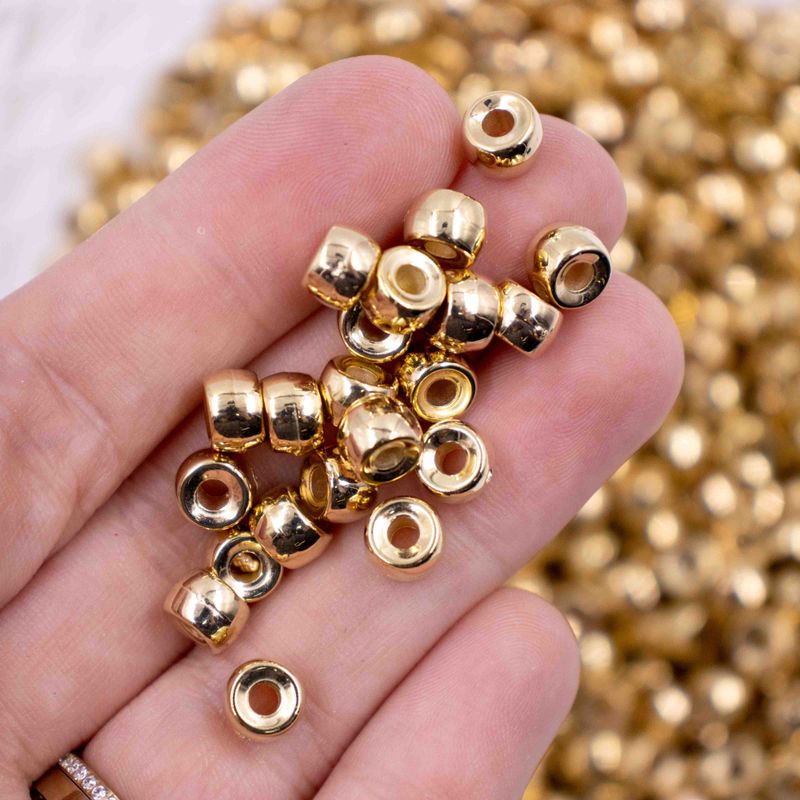ENTREMEIO-REDONDO-LISO-05X08MM-EM-ABS-COM-250GR---073---DOURADO-073