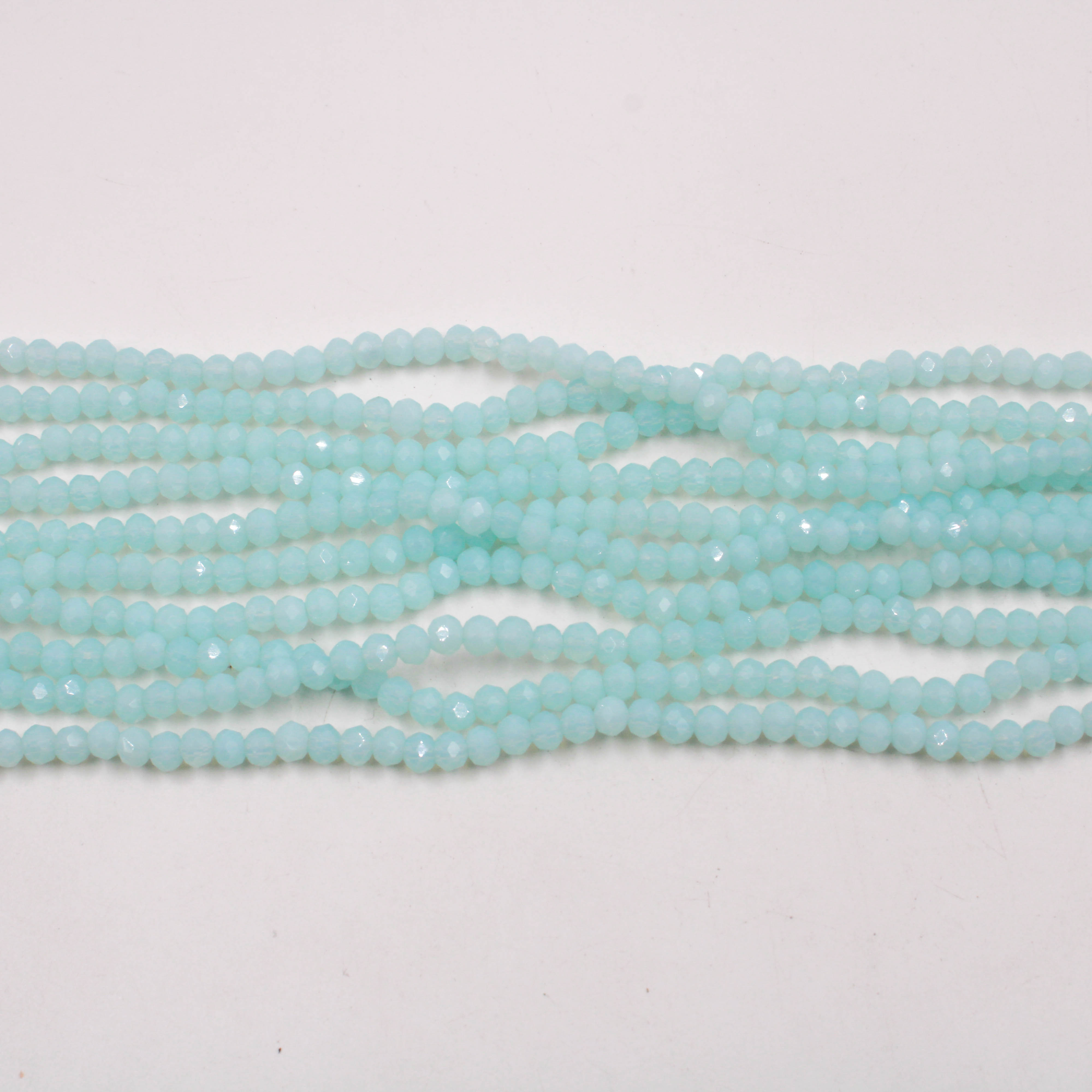 FIO-DE-CRISTAL-LEITOSO-04MM-EM-VIDRO-COM-10-FIOS---AZUL-TIFFANY