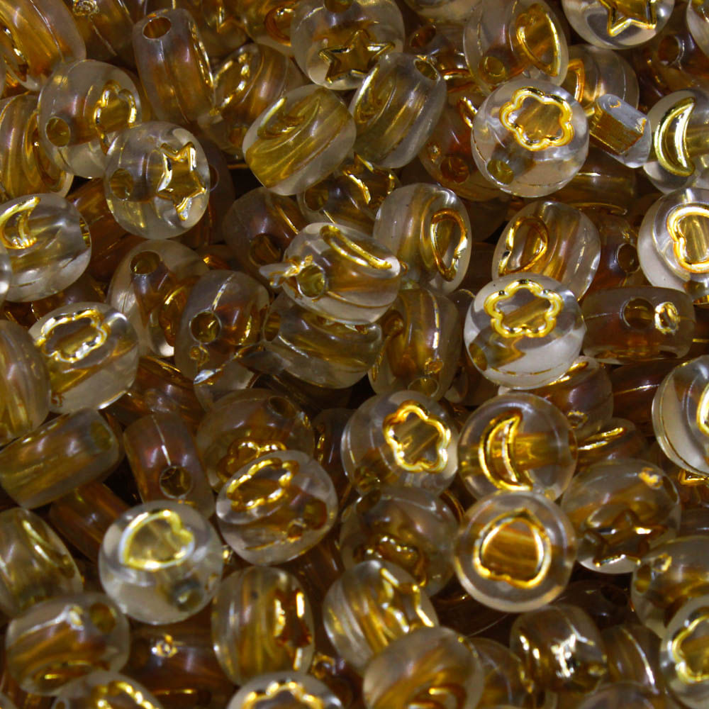 Entremeio Redondo Translucido Simbolos 04x07mm em Plástico com 50gr